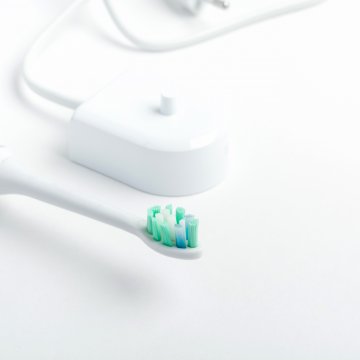 Electric toothbrush with charger